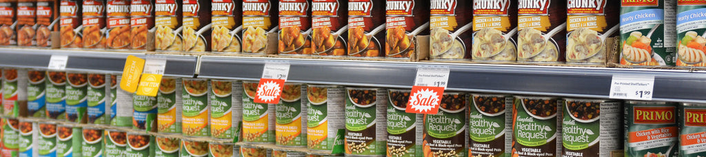 Soup aisle shelf edge in grocery store with Flex Series ticket molding and ShelfTalkers installed