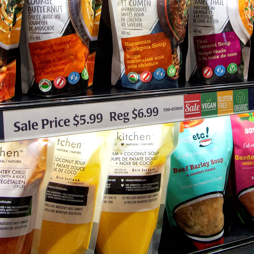 Deli refridgerated shelf with bagged soups featuring a ClearVision ticket molding and ChipTalkers.