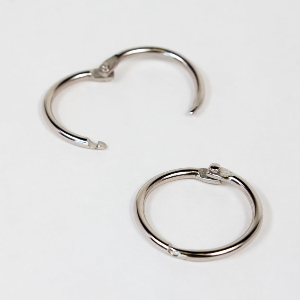The Metal Ring with Snap Hinge, both open and closed