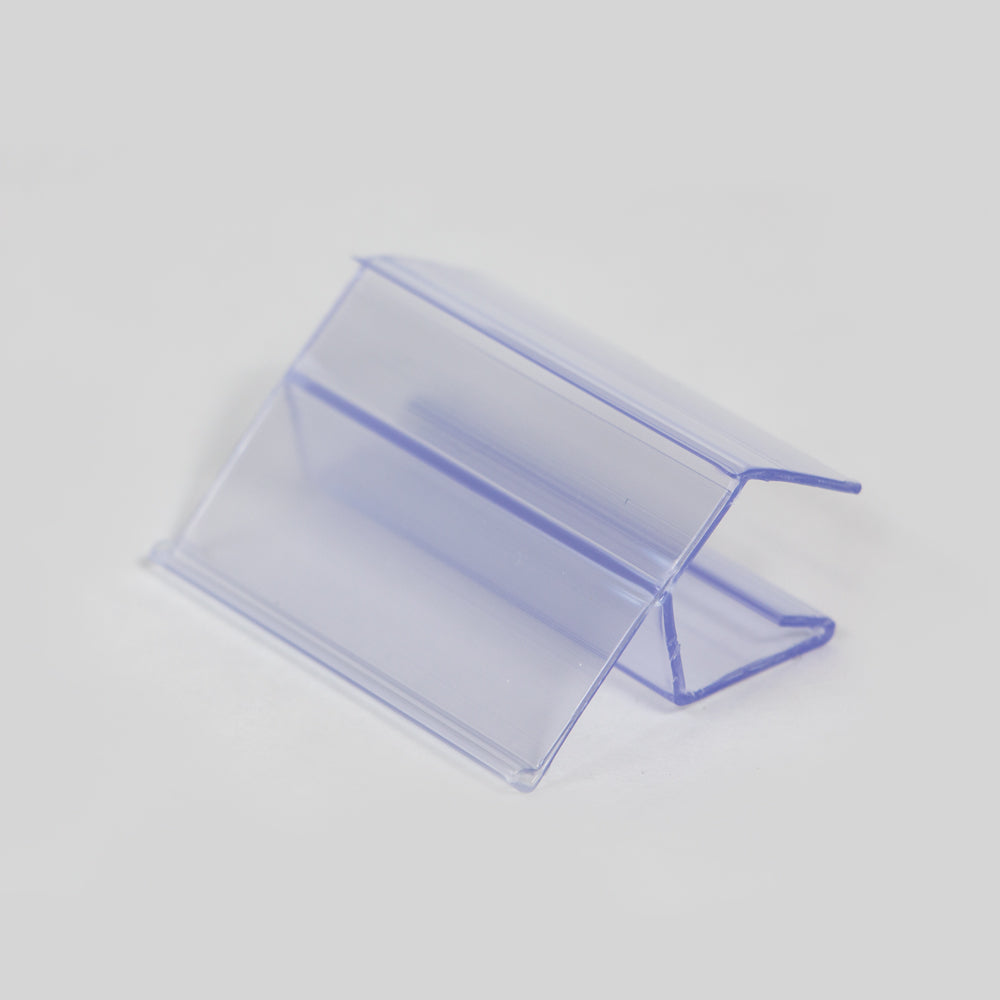 A short cut of the ClearVision 0.625-0.75" Thick Shelf, 15° Angle Ticket Molding