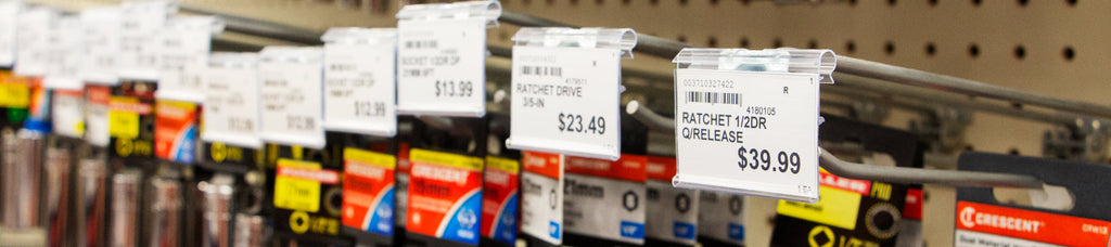 Small plate scanning hooks with label holders in a hardware section of a store