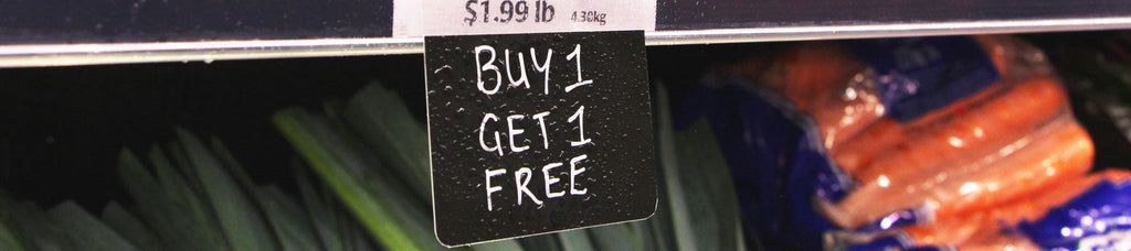 A ChalkTalker with 'Buy 1 Get 1 Free' written on it