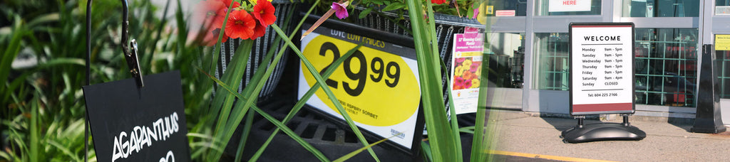 Various outdoor sign holders in garden sections and front of store