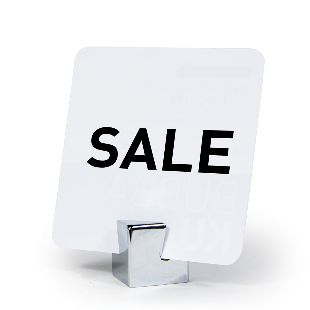The cube Stainless Steel Sign Holder holding a "sale" sign