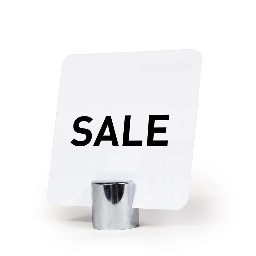 The cylinder Stainless Steel Sign Holder holding a "sale" sign